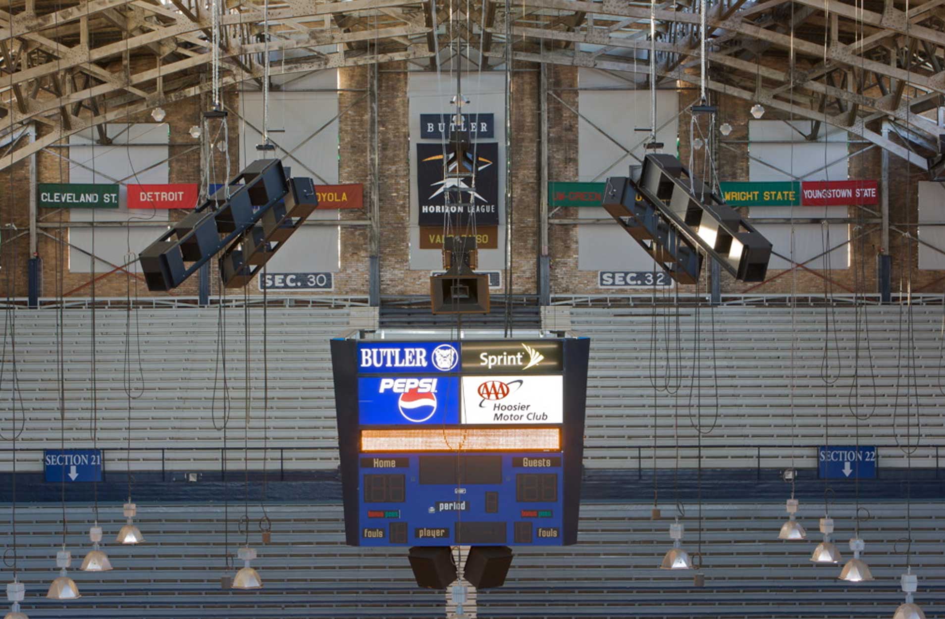Butler University scoreboard with THMINI's in an array above